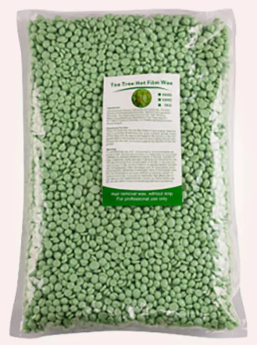 Green tea hard wax beans in bulk bag from the cosmetics plant